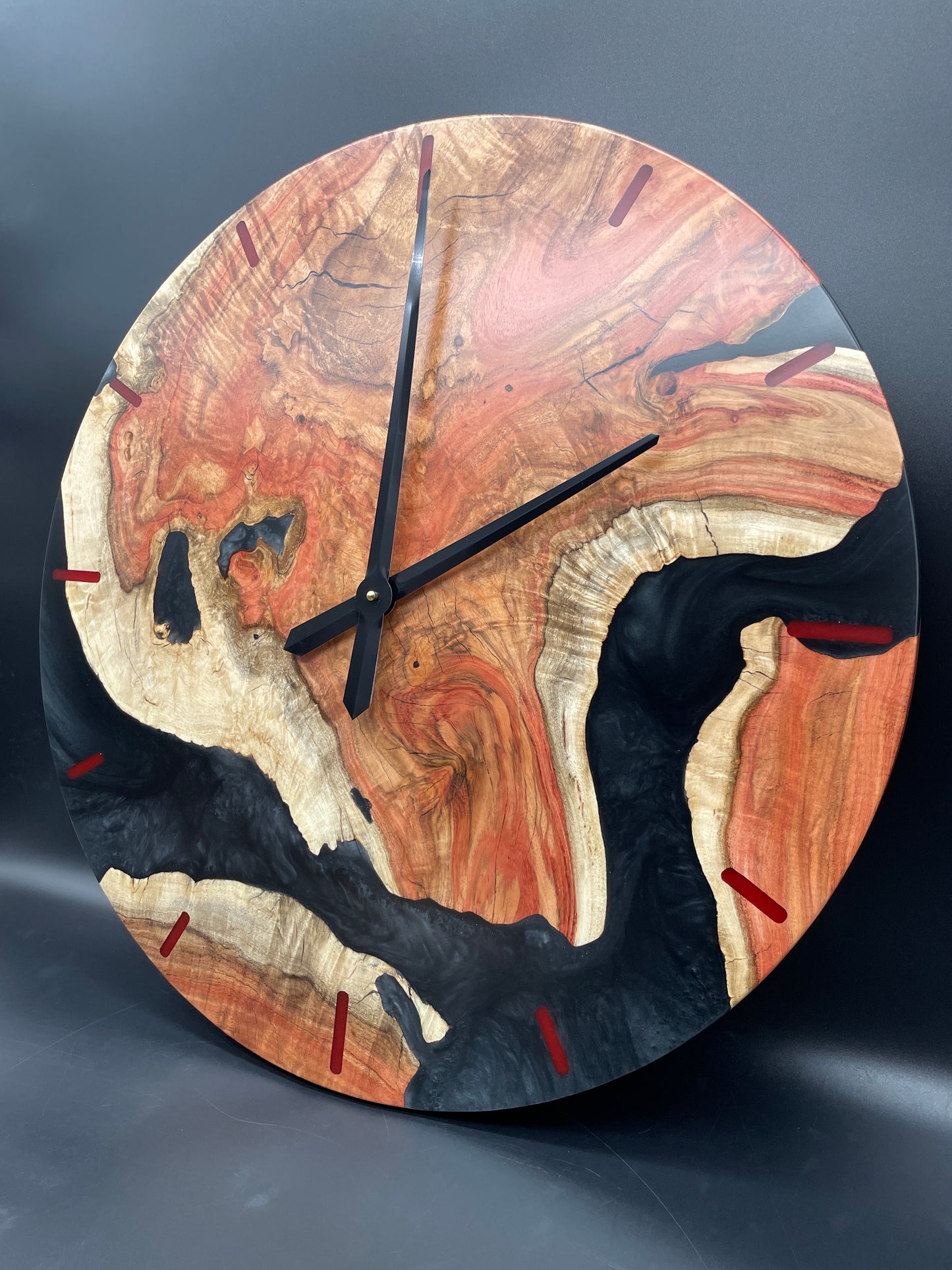 Carob Encased Round Wall Clock with Caviar Black Epoxy