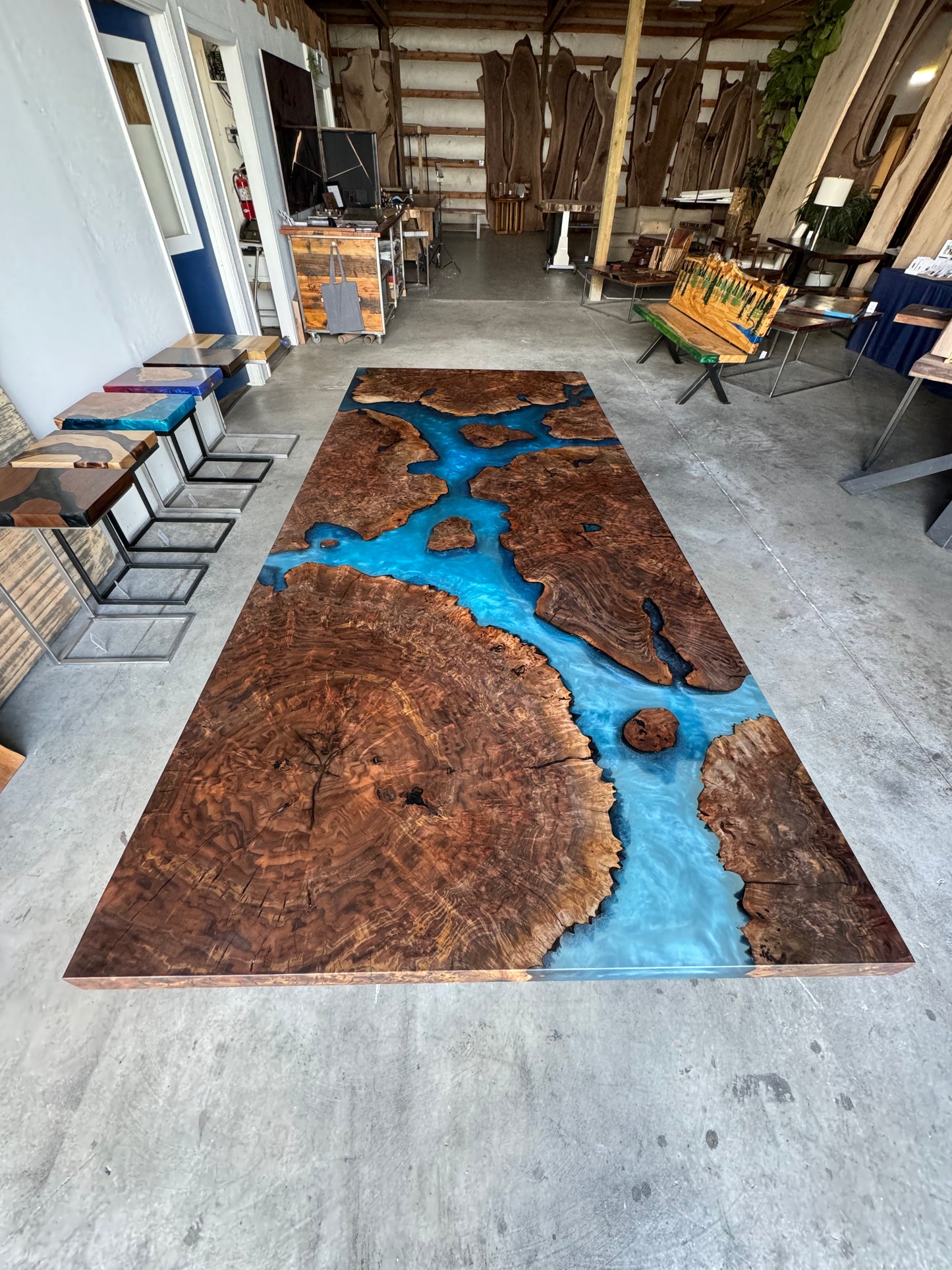 Claro Walnut Burl Dining Table with Multi-Blue Epoxy Encasement