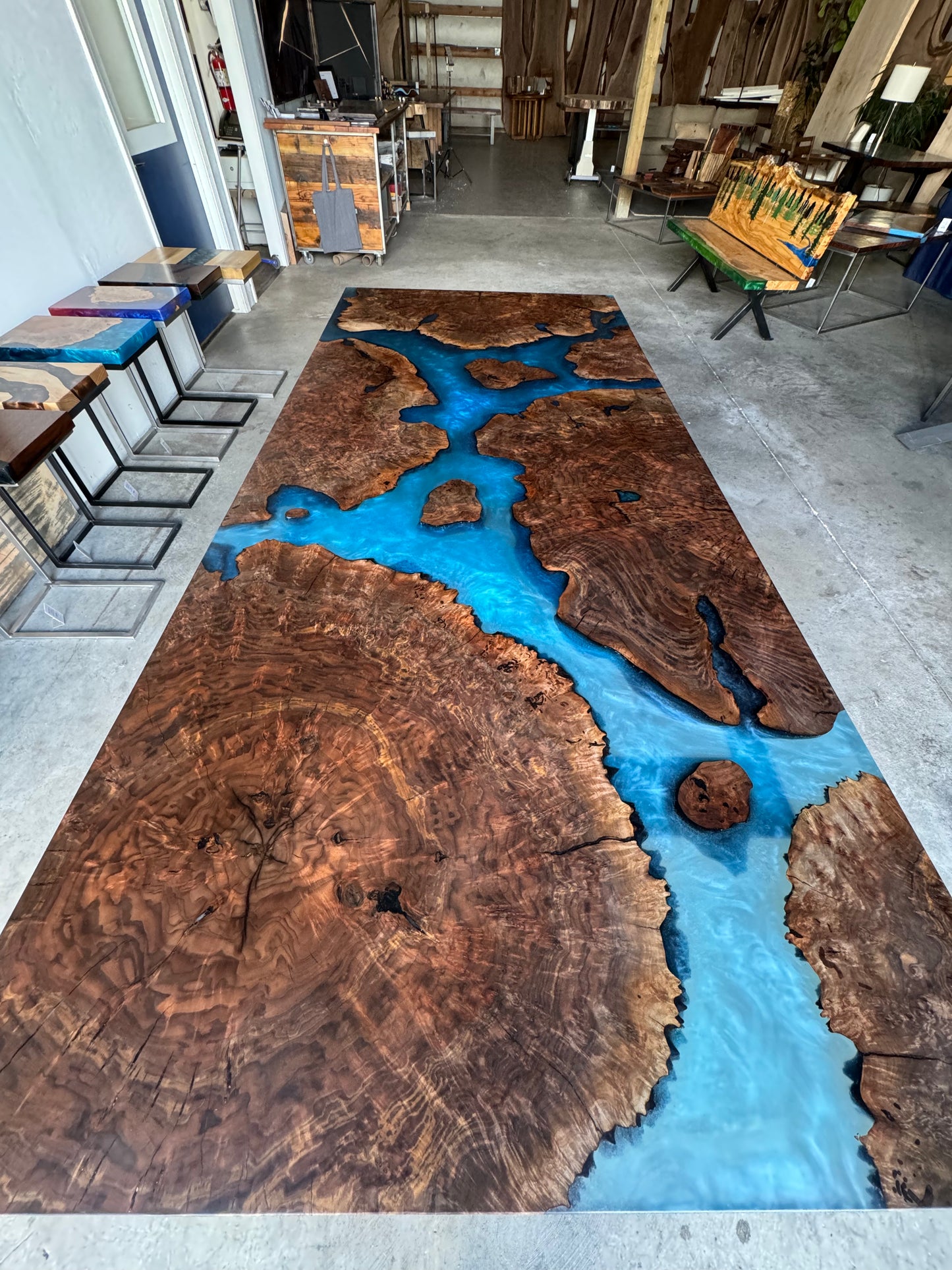 Claro Walnut Burl Dining Table with Multi-Blue Epoxy Encasement