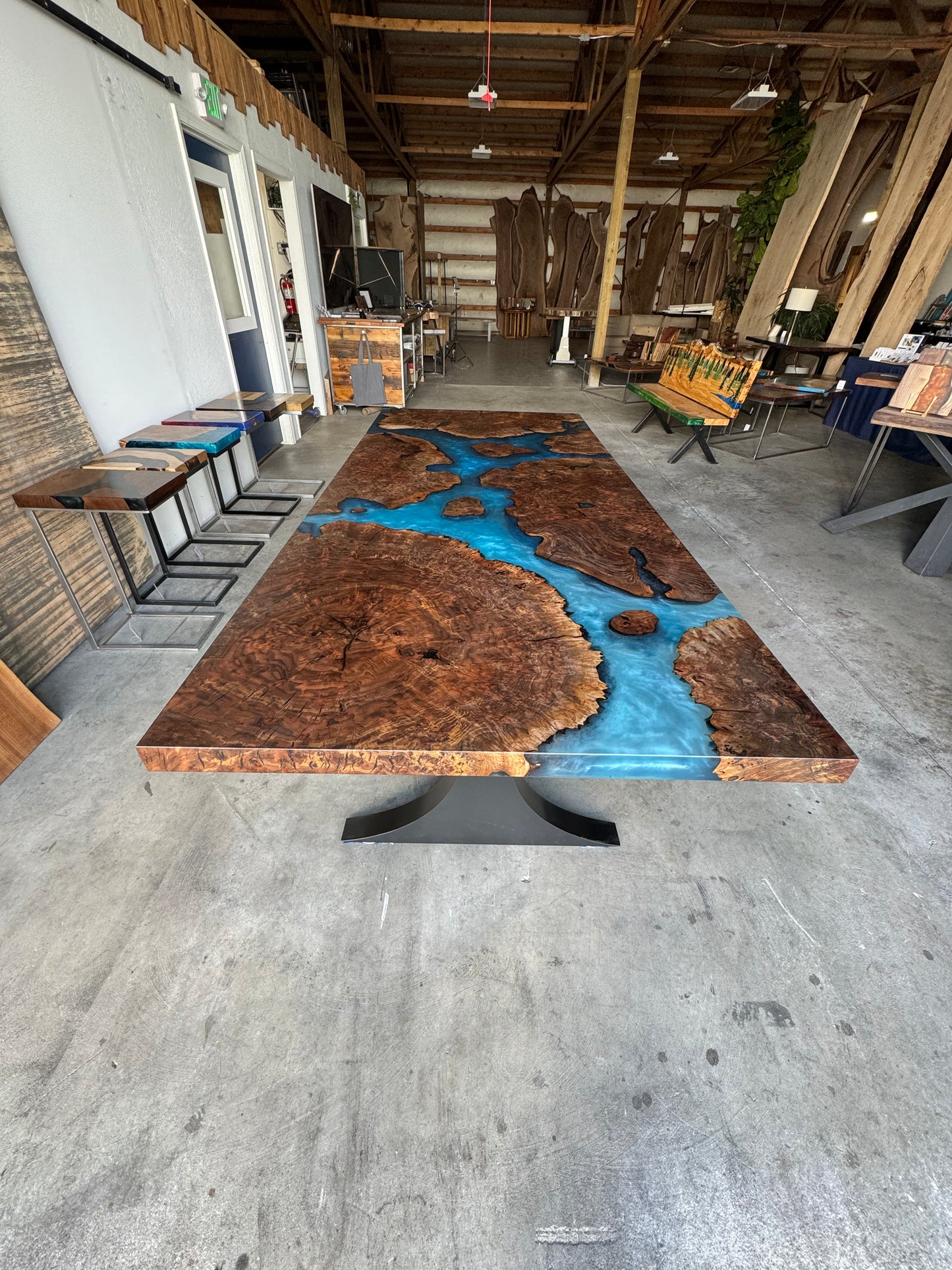 Claro Walnut Burl Dining Table with Multi-Blue Epoxy Encasement