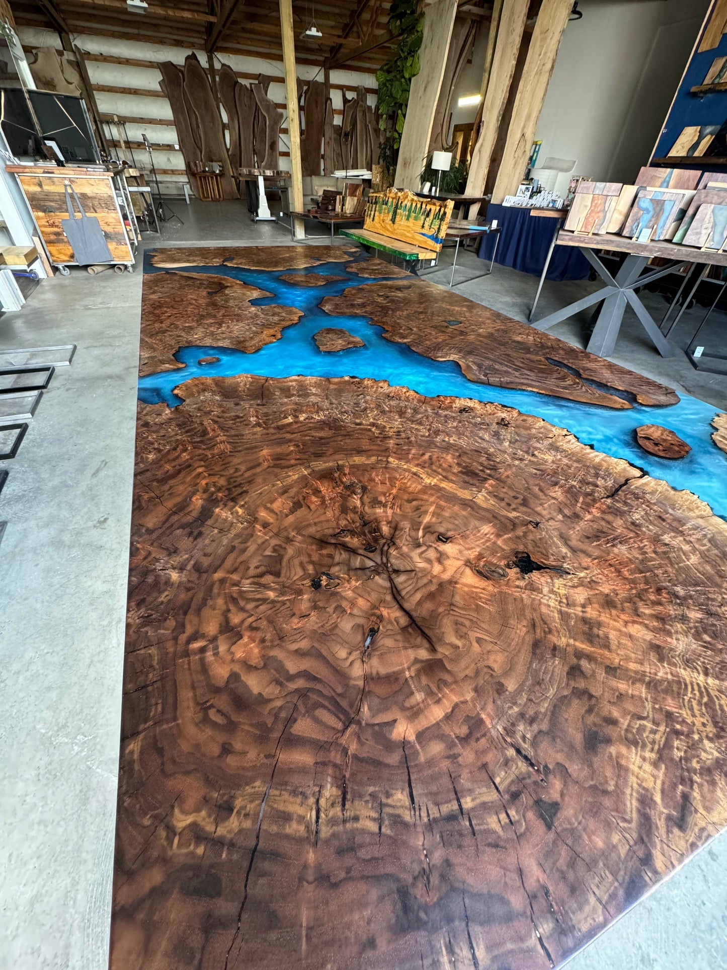 Claro Walnut Burl Dining Table with Multi-Blue Epoxy Encasement