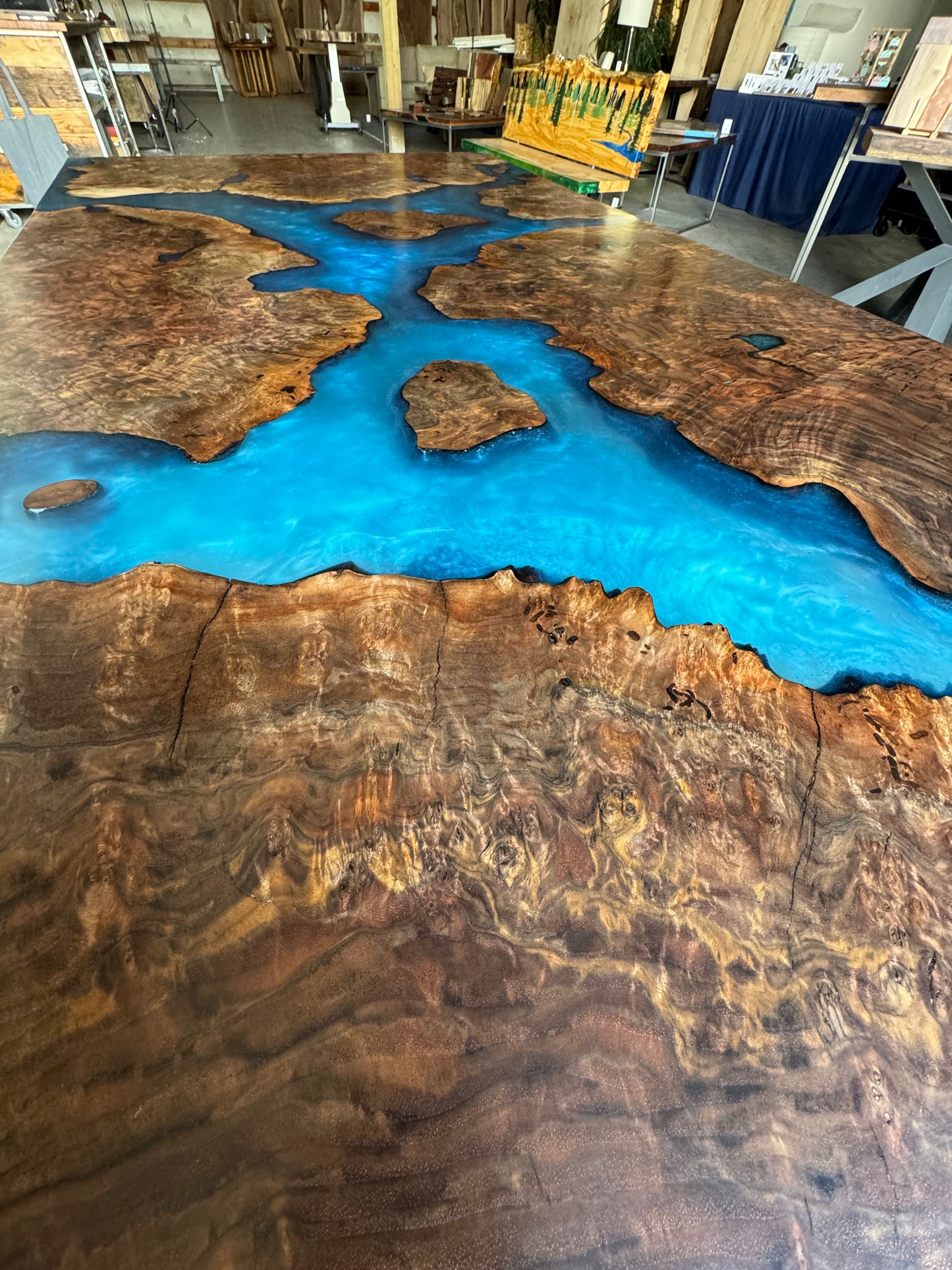 Claro Walnut Burl Dining Table with Multi-Blue Epoxy Encasement