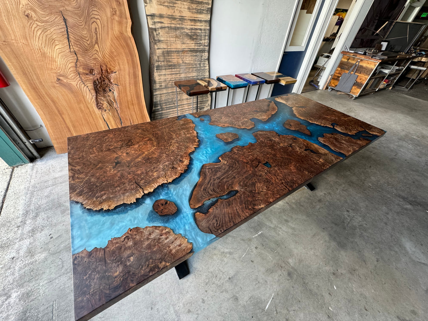 Claro Walnut Burl Dining Table with Multi-Blue Epoxy Encasement