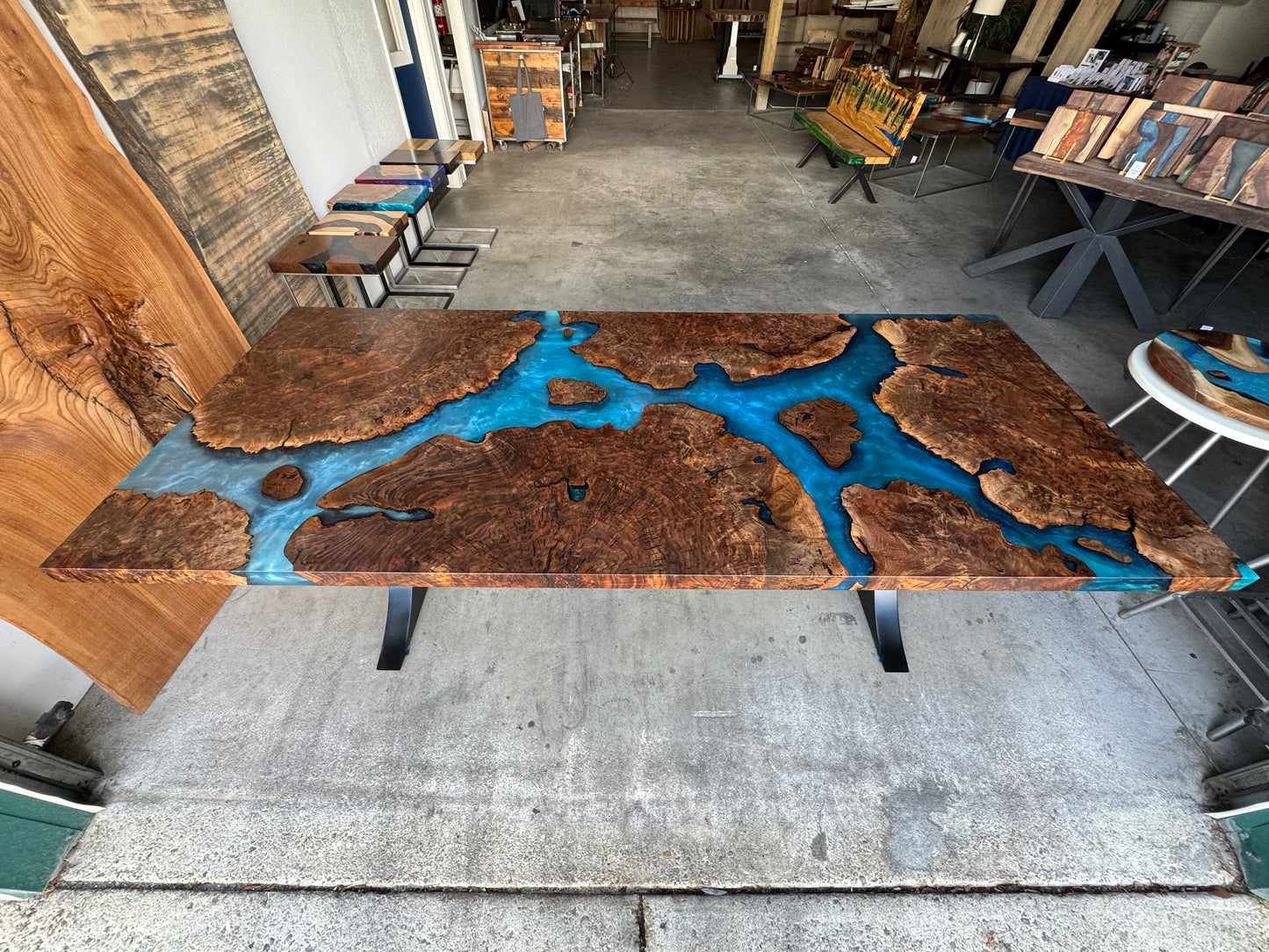 Claro Walnut Burl Dining Table with Multi-Blue Epoxy Encasement