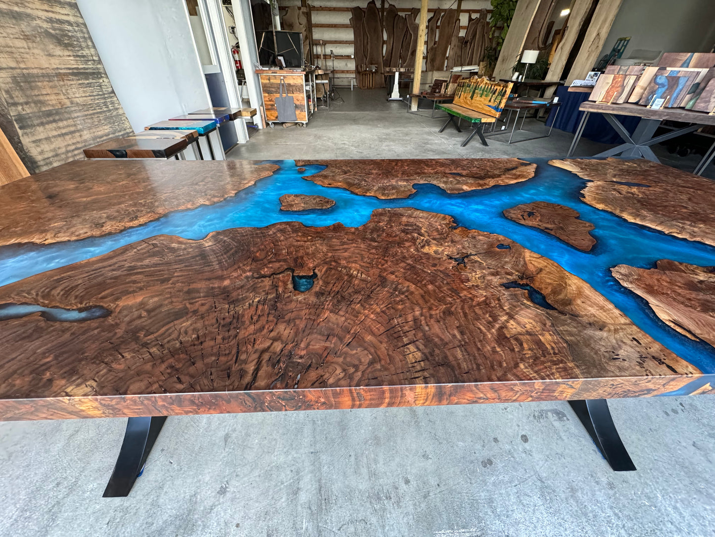 Claro Walnut Burl Dining Table with Multi-Blue Epoxy Encasement