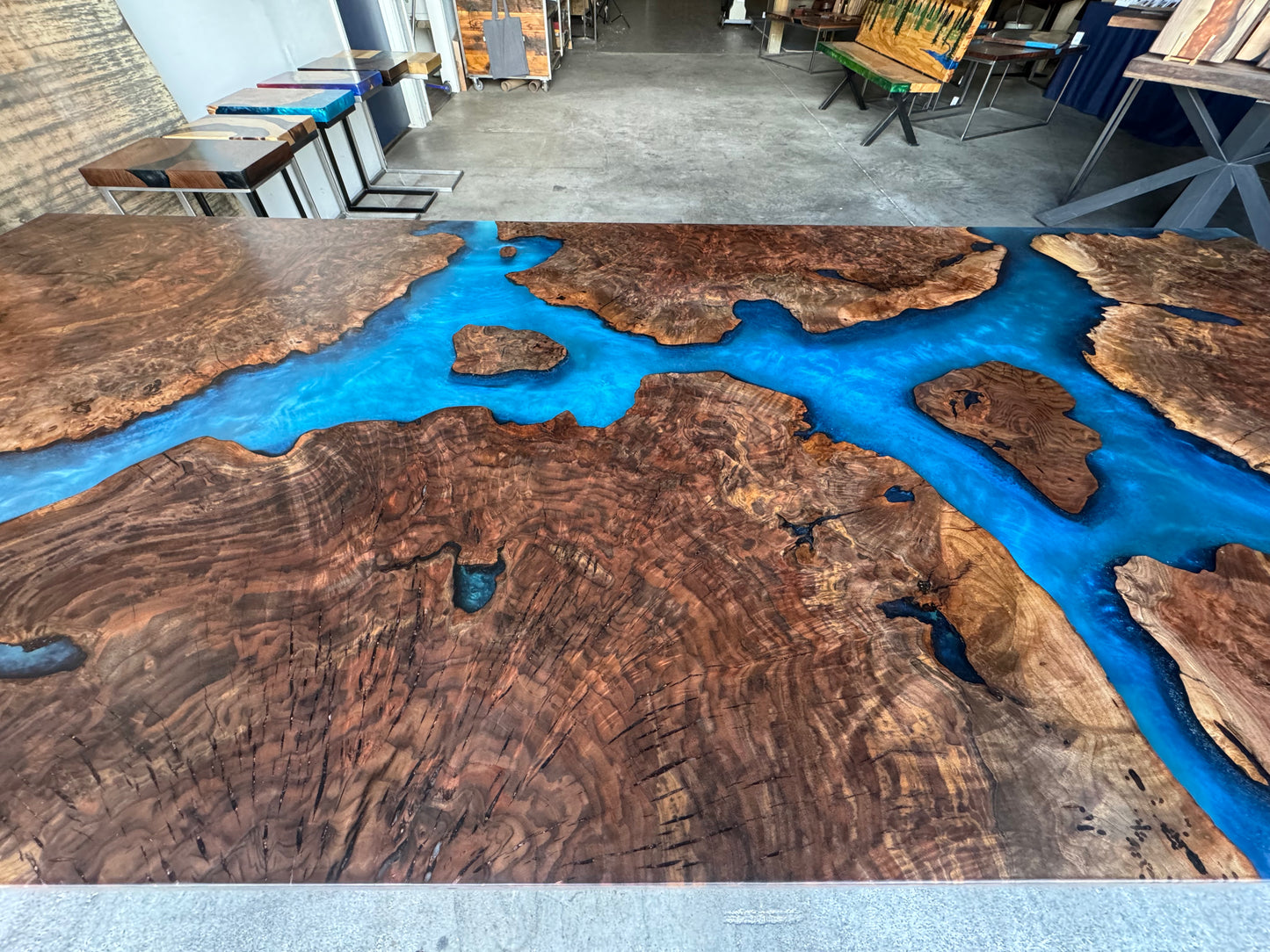 Claro Walnut Burl Dining Table with Multi-Blue Epoxy Encasement