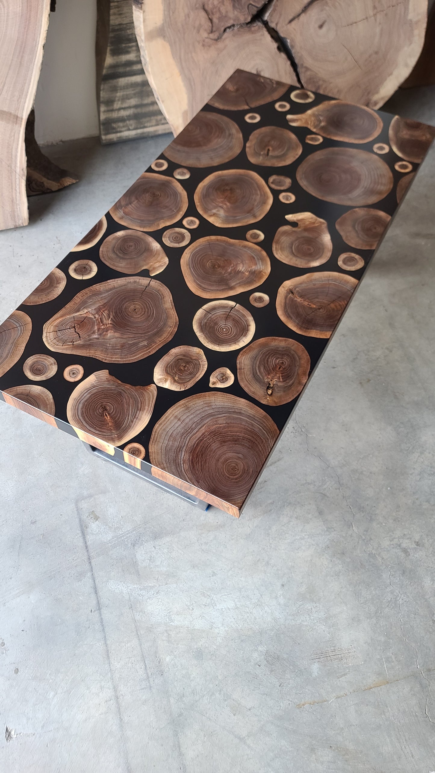 Black Walnut Wooden Branch Rounds and Solid Black Epoxy Coffee Table