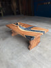 American elm coffee table with charcoal-grey epoxy river and custom-shaped solid elm legs
