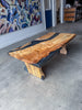 Spalted maple coffee table with caviar-black epoxy river and matching spalted maple pedestal legs
