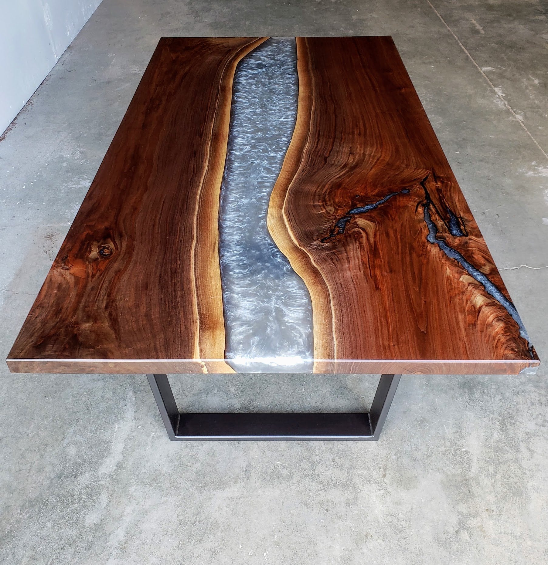 Black walnut epoxy store dining table